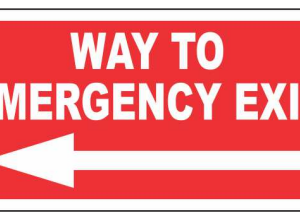 Red WAY TO EMERGENCY EXIT sign with a left-pointing arrow by Safe Cure